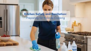 Person sanitizing a kitchen countertop in a clean and organized North American style home during holiday preparation.